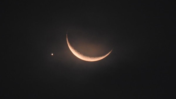 In pictures: Venus at the tip of a glowing crescent moon over Singapore