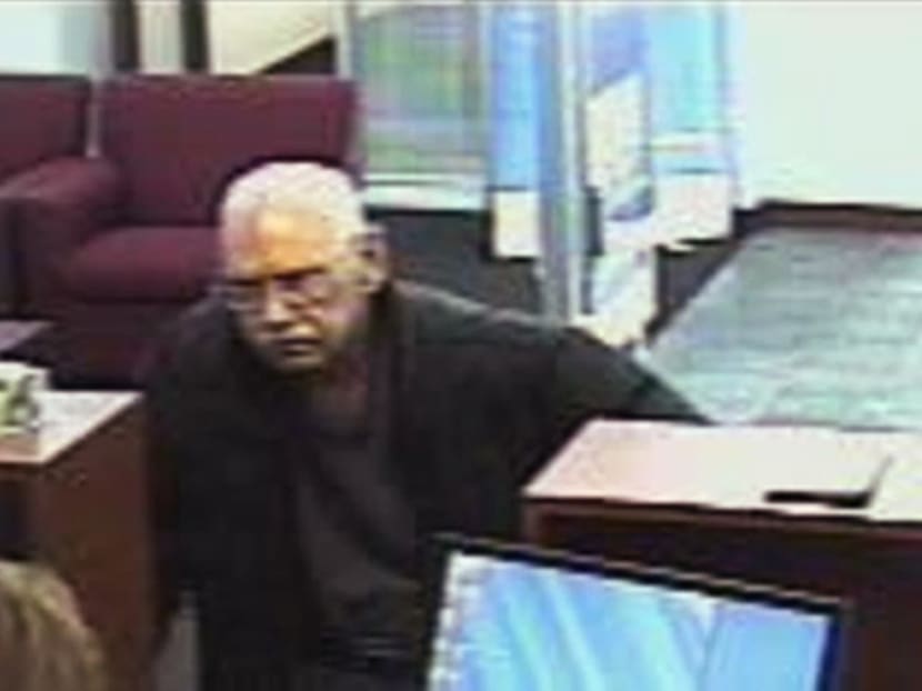 This Feb 9, 2013 file surveillance photo provided by the FBI shows 73-year-old Walter Unbehaun during a bank robbery. Photo: AP
