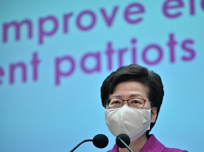 Hong Kong's chief executive Carrie Lam speaks during a press conference at the government headquarters in Hong Kong on March 8, 2021, following her return from Beijing where she attended the opening of the National People's Congress last week. Hong Kong's chief executive Carrie Lam speaks during a press conference at the government headquarters in Hong Kong on March 8, 2021, following her return from Beijing where she attended the opening of the National People's Congress last week.
