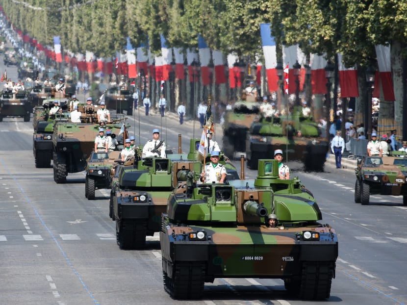 French Char Leclerc tanks of the 5th Dragoon Regiment (5e Regiment de Dragons), take part in the annual Bastille Day military parade on the Champs-Elysees avenue in Paris on July 14, 2018.