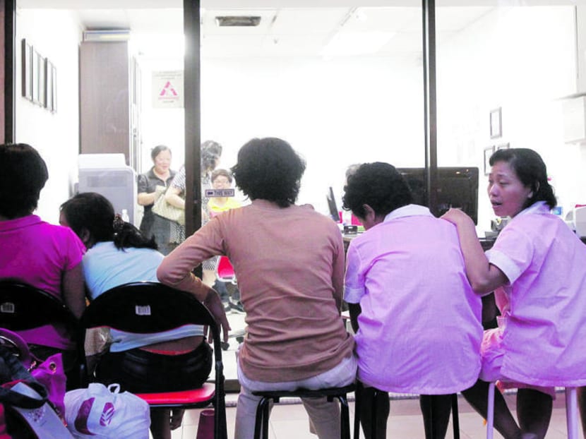 Foreign domestic workers at an employment agency. TODAY file photo