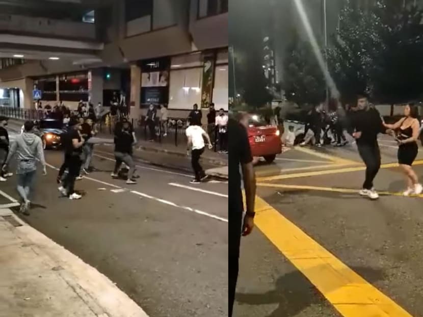 Screengrabs from a 14-second video posted by Facebook user Patrick Tan of the altercation which took place near Orchard Towers on Sunday (Aug 14) morning. Screengrabs from a 14-second video posted by Facebook user Patrick Tan of the altercation which took place near Orchard Towers on Sunday (Aug 14) morning.