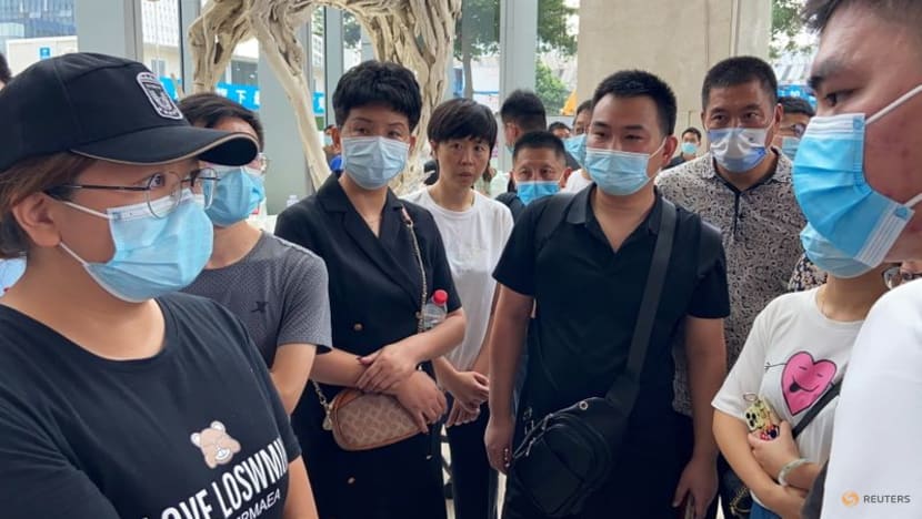 Disgruntled China Evergrande investors crowd headquarters in protest Disgruntled China Evergrande investors crowd headquarters in protest