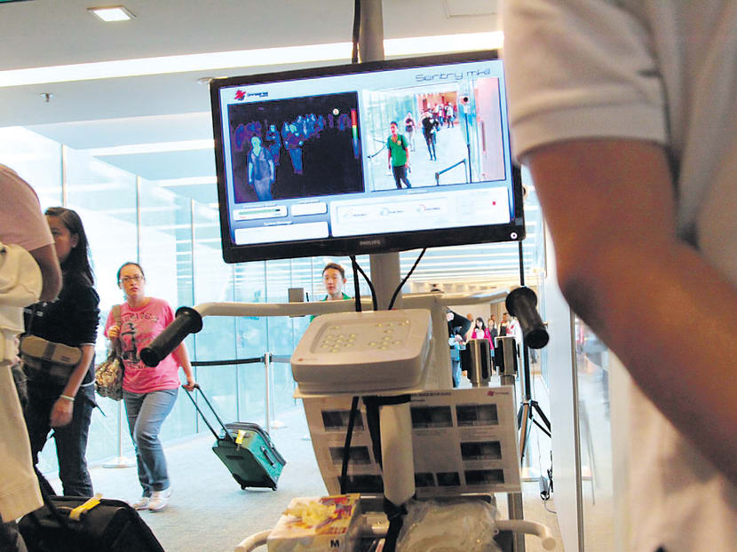 MERS Temperature Screening at Changi Airport Terminal 3. Photo: Don Wong