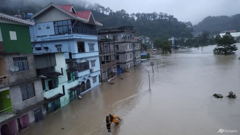 Fourteen dead, 102 missing after Indian glacial lake bursts bank in heavy rain