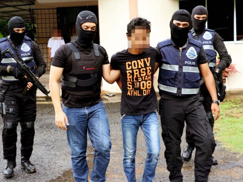 Malaysian police arresting IS militants suspected of planning terror attacks last October. IS has openly targeted South-east Asia as among its prime locations to establish caliphates. Photo: Polis Diraja Malaysia