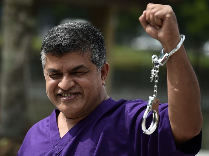 The police freed cartoonist Zunar after recording his statement regarding a superimposed photo of the prime minister on a Facebook page. Photo: The Malaysian Insider