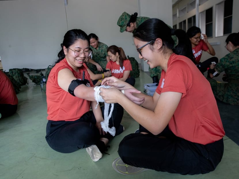 TODAY journalist Loraine Lee participate in the Combat Buddy Aid acitivity during the Women’s Boot Camp on Feb 11, 2023.