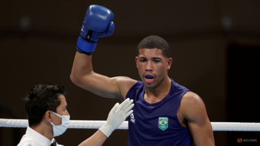 Olympics-Boxing-Sousa's last-gasp knockout earns Brazil gold, historic win for Turkey Olympics-Boxing-Sousa's last-gasp knockout earns Brazil gold, historic win for Turkey