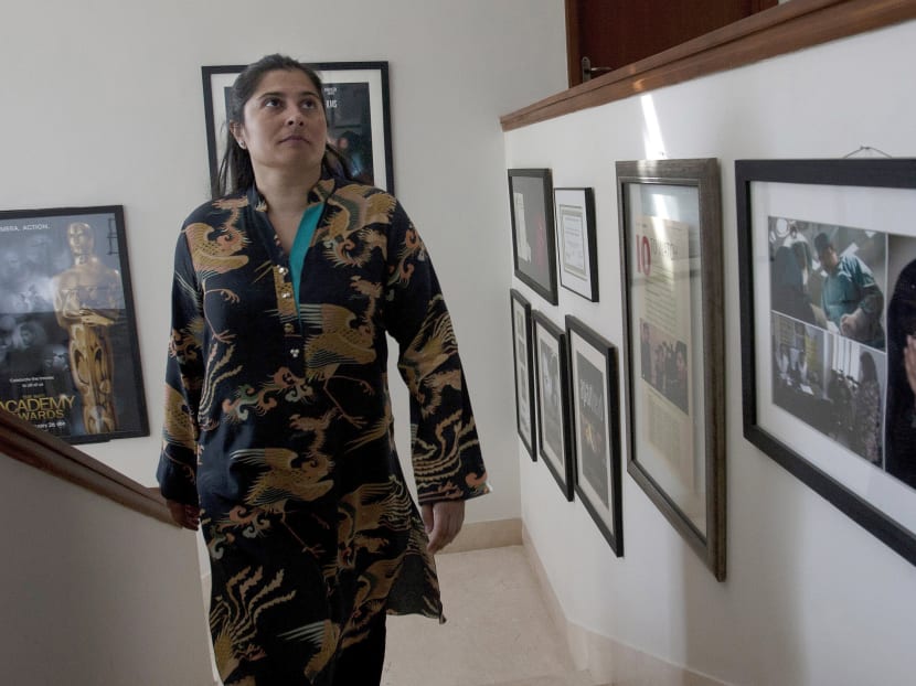 In this Feb 2, 2016 photo, Pakistan's Oscar winning filmmaker, Sharmeen Obaid-Chinoy arrives at her office in Karachi, Pakistan. Obaid-Chinoy is nominated for a second Oscar for her moving story of a teenage girl shot and dumped into a river because she married a man of her choosing. Photo: AP