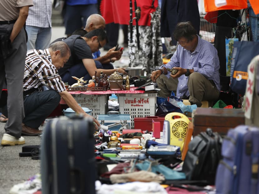 Although Monday (July 10) marks the last day for the Sungei Road flea market, vendors have been offered an alternative location at Golden Mile Tower carpark. Photo: Raj Nadarajan/TODAY