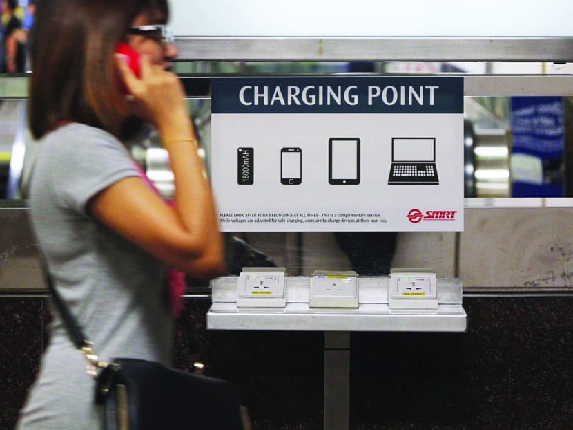 The first charging point was installed at City Hall 
MRT station 
late last week. Photo: Don Wong
