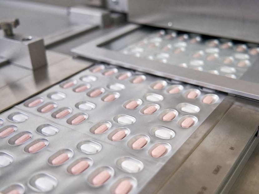 Paxlovid, a pill by Pfizer to treat Covid-19, is seen manufactured in Ascoli, Italy, in this undated handout photo obtained by Reuters on Nov 16, 2021. 