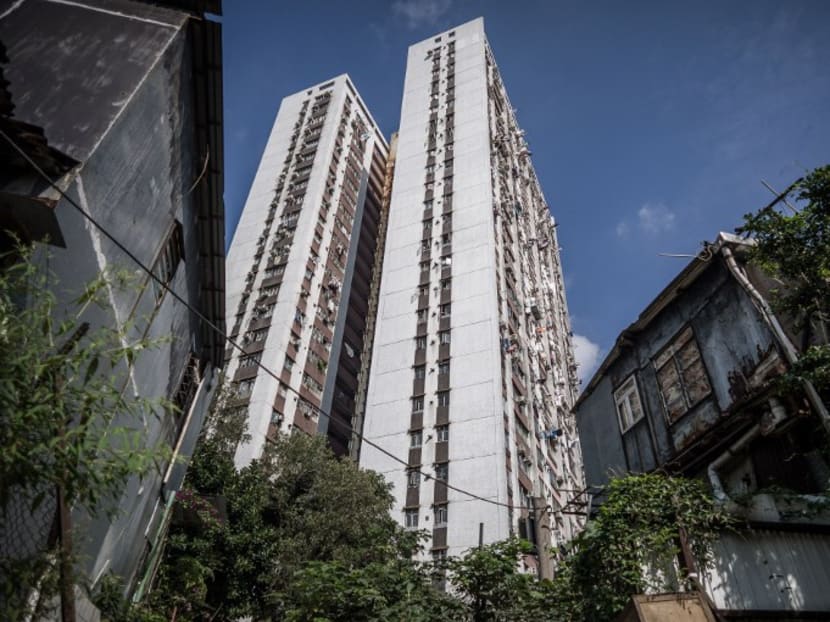 High rise residential buildings seen from the Nga Tsin Wai village to be demolished as part of a city re-urbanisation plan in Hong Kong. Photo: AFP