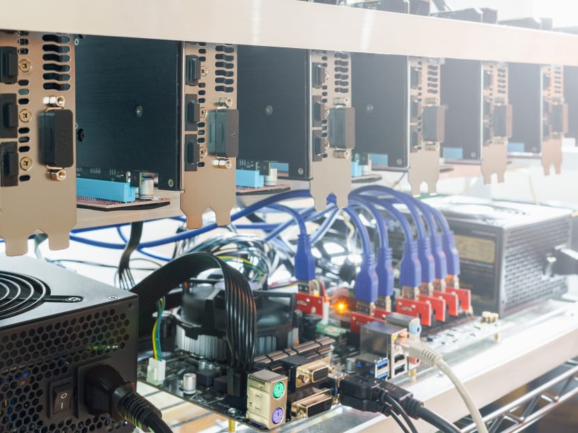 A crypto-mining rig (pictured) uses hardware to solve equations that validate cryptocurrency transactions, but the equipment uses a lot of energy and releases a lot of heat in doing so.