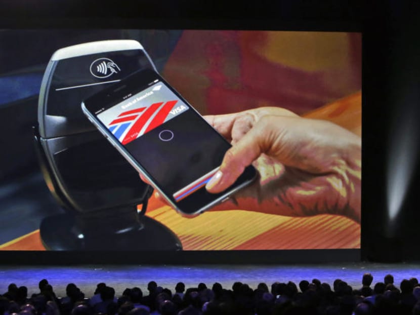 Apple CEO Tim Cook introducing Apple Pay. Photo: AP Apple CEO Tim Cook introducing Apple Pay. Photo: AP