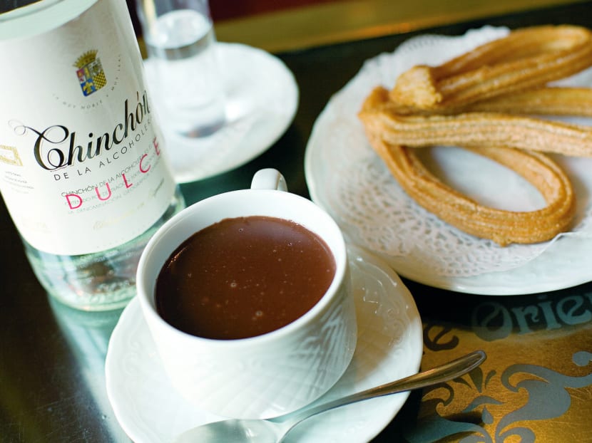 Be sure to order a churros con chocolate when you're in Spain. Photo: Spain Tourism