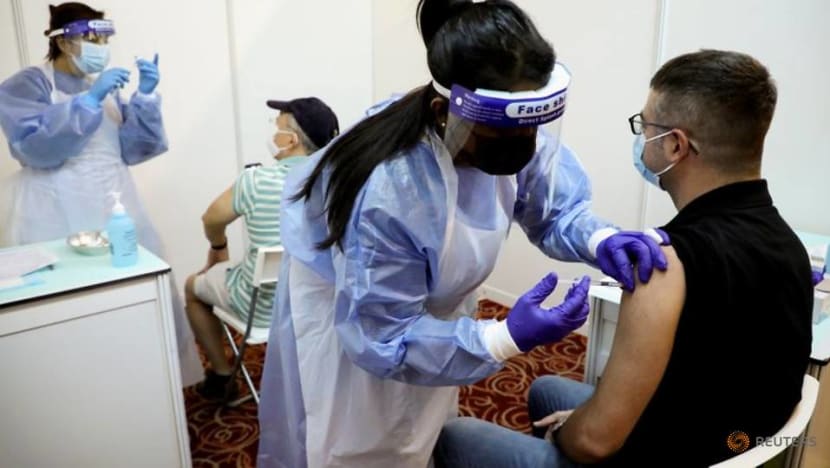 As Malaysia grapples with record COVID-19 cases, authorities ramp up mass vaccination to stem the tide As Malaysia grapples with record COVID-19 cases, authorities ramp up mass vaccination to stem the tide