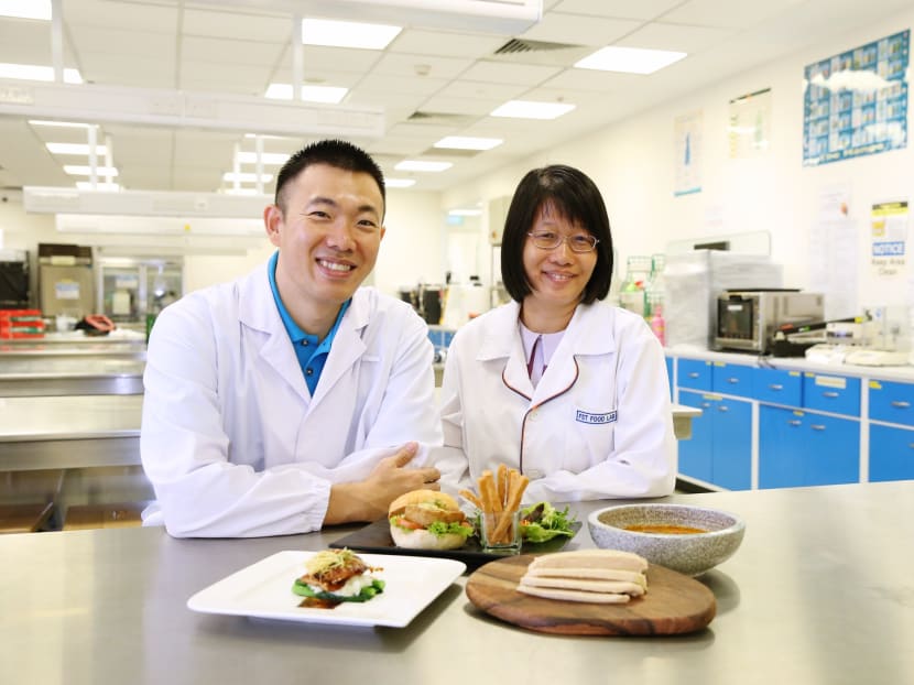 Mr Ricky Lin (left), founder of Life3 Biotech, and Dr Leong Lai Peng, senior lecturer in the NUS Department of Chemistry's Food Science and Technology Programme. Photo: Koh Mui Fong/TODAY