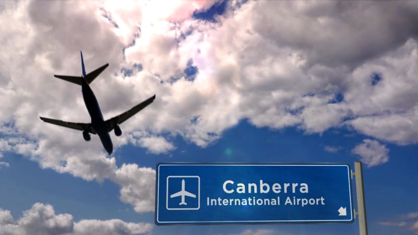 Gunman detained after firing shots in Canberra airport Gunman detained after firing shots in Canberra airport