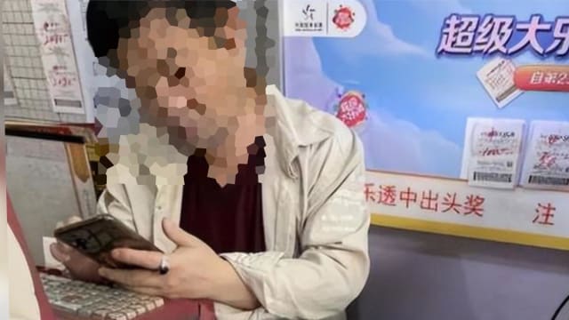 彩票打错号码顾客不要 中国彩票店主倒贴三元买下中大奖