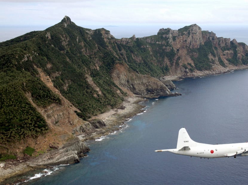 A Japanese surveillance plane flying over the disputed islands in the East China Sea. Reuters file photo