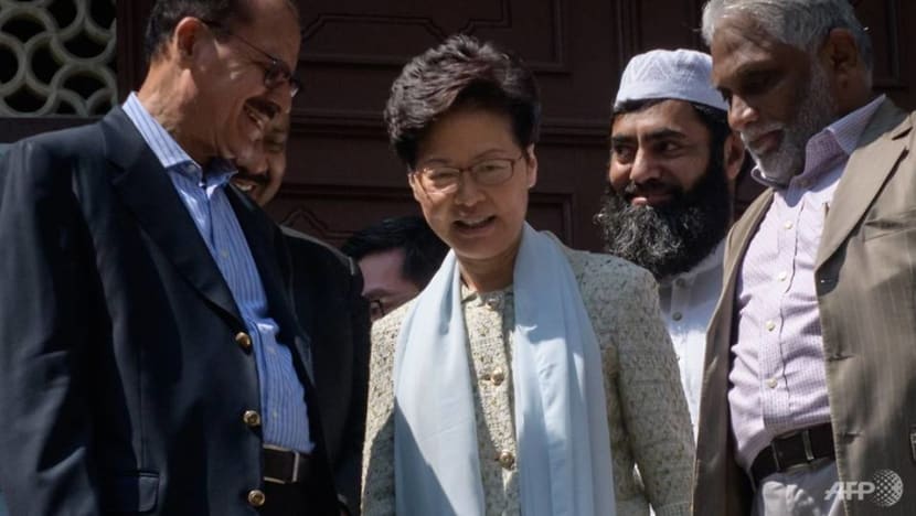 Hong Kong leader Carrie Lam visits mosque struck by blue water cannon dye Hong Kong leader Carrie Lam visits mosque struck by blue water cannon dye
