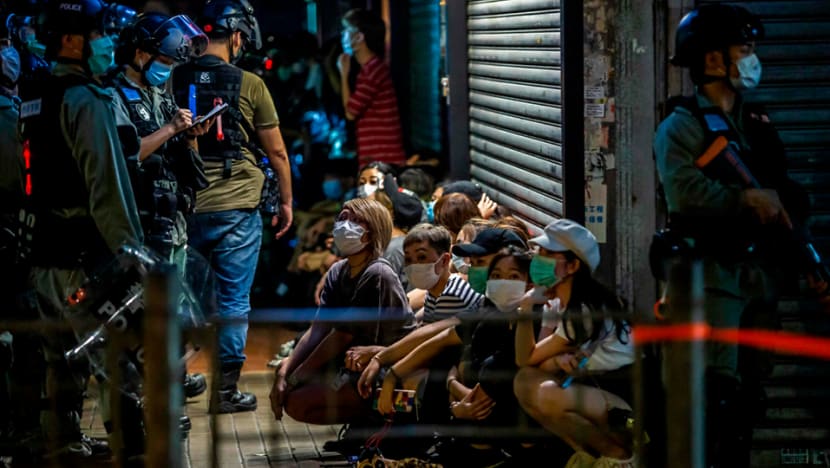 Hong Kong police arrest more than 200 as protests return Hong Kong police arrest more than 200 as protests return