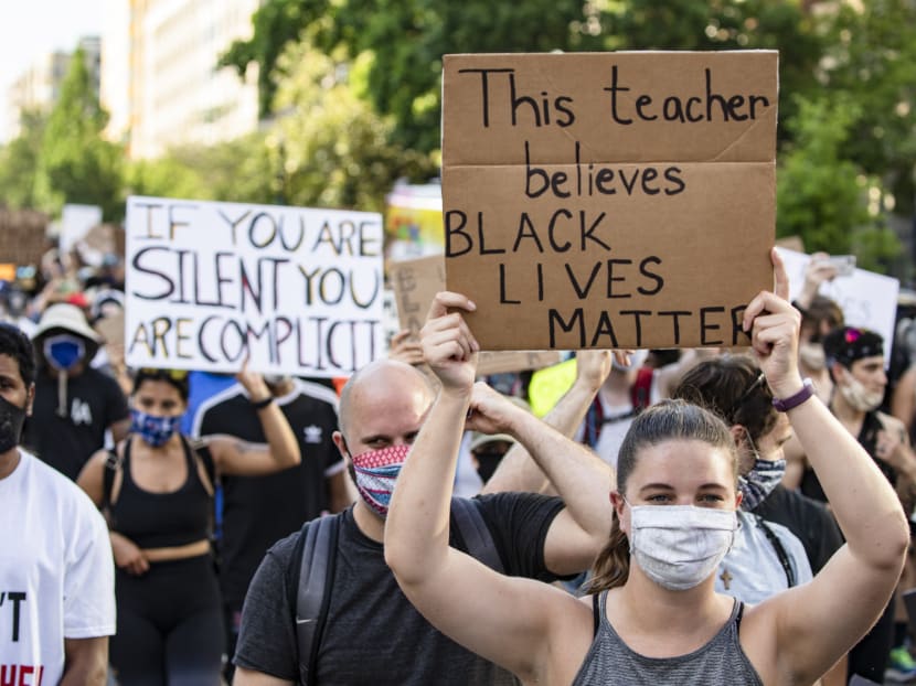Protesters march towards the White House during demonstrations sparked by the killing of George Floyd, on June 6, 2020, in Washington, DC. Protesters march towards the White House during demonstrations sparked by the killing of George Floyd, on June 6, 2020, in Washington, DC.