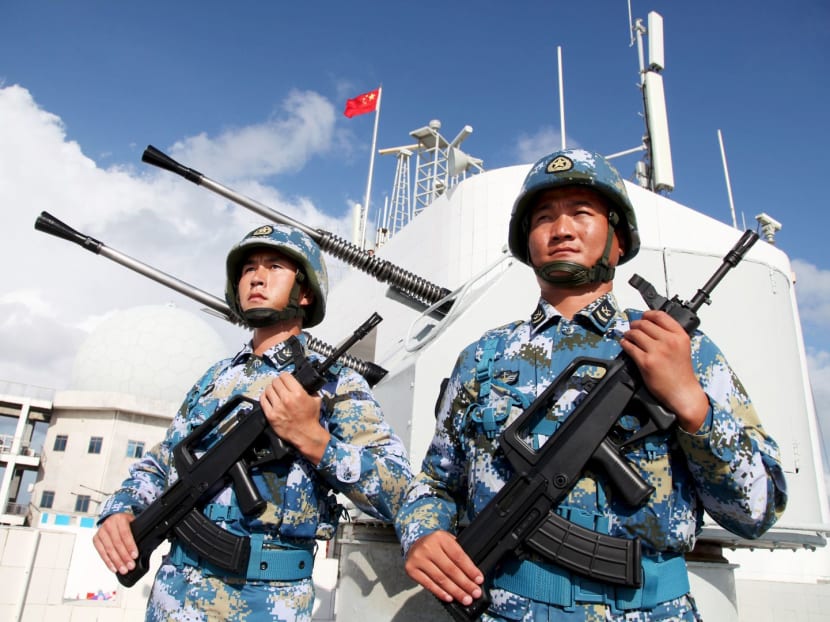 Soldiers of China's People's Liberation Army (PLA) Navy stand guard in Nansha Islands. Photo: Reuters