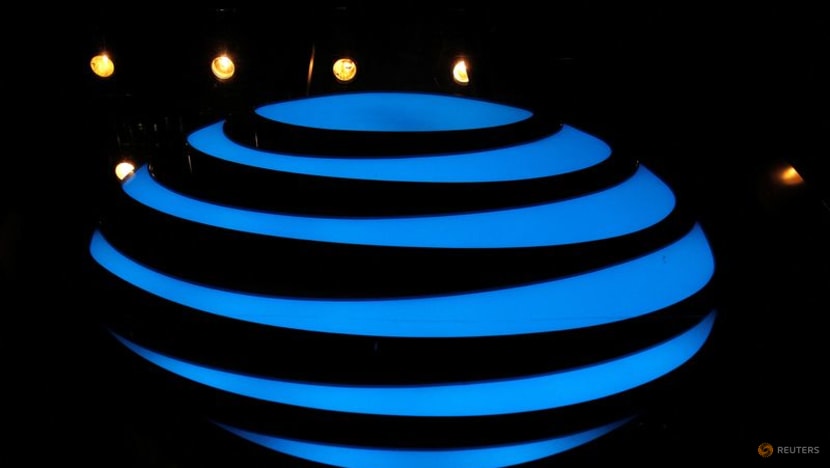 AT&T adds more wireless subscribers than expected; shares rise 