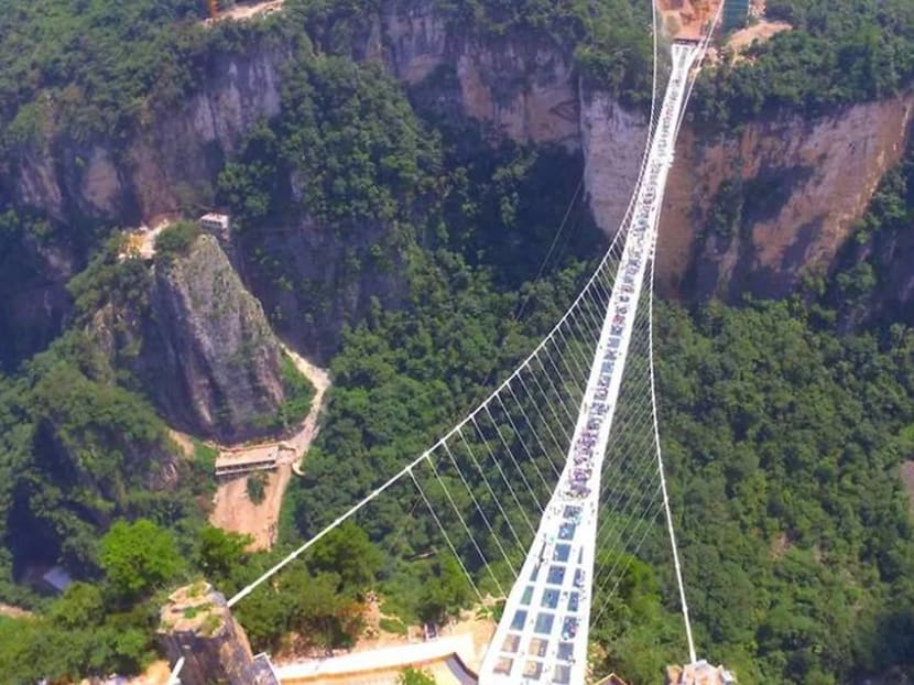 World's highest bungy jump: China tourists can now take a 260-metre leap from Zhangjiajie Grand Canyon Glass Bridge