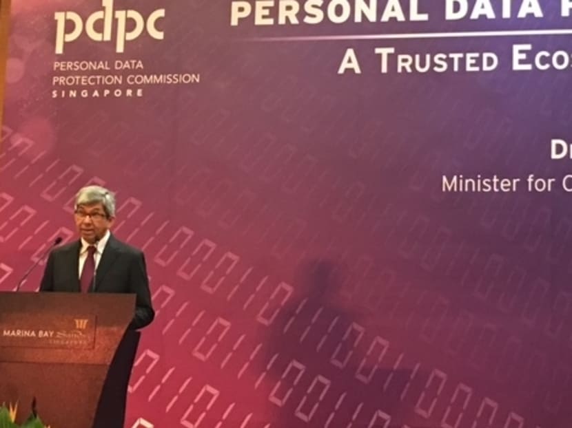 Minister for Communications and Information Dr Yaacob Ibrahim announcing a proposed review of the Personal Data Protection Act at the Personal Data Protection Seminar on Thursday (Jul 27). Photo: Tan Weizhen/TODAY