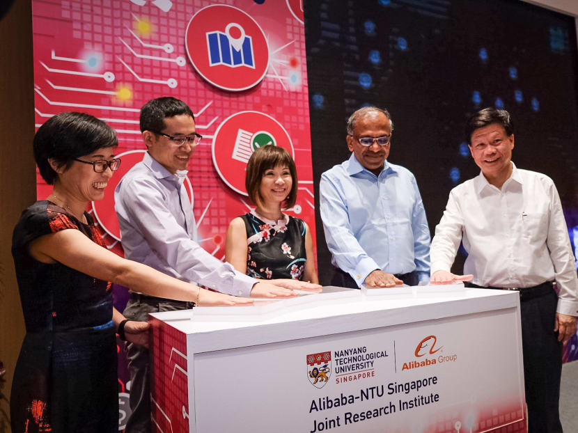 (From right to left) Prof Lam Khin Yong, NTU Vice President (Research), Prof Subra Suresh, NTU President; Dr Amy Khor, Senior Minister of State for the Ministry of the Environment and Water Resources and Ministry of Health, Singapore; Mr Jeff Zhang, Alibaba Group CTO; and Ms Liu Xiangwen, Director, Technology Strategy Department at Alibaba Group; launching the new Joint Research Institute. Photo: NTU Singapore