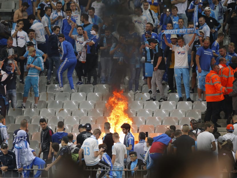 Marseille's fans light a fire after PSG won the French Cup final soccer match between Marseille and PSG at the Stade de France Stadium on Saturday (May 21). Photo: AP