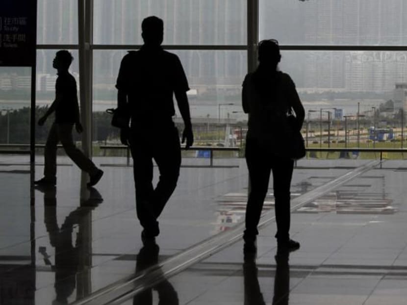 Travellers at Hong Kong International Airport. Photo: Reuters