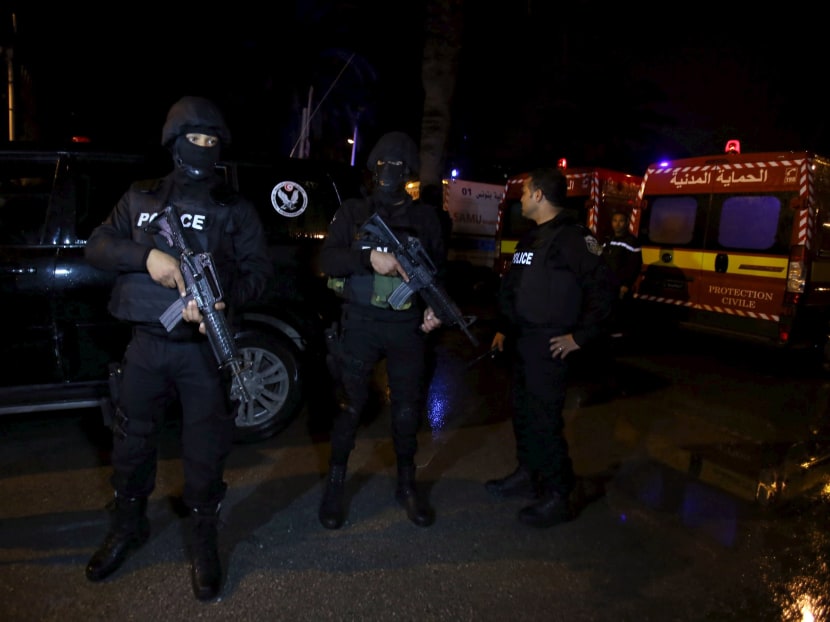 Tunisian police officers are pictured after an attack on a military bus in Tunis, Tunisia. Photo: Reuters