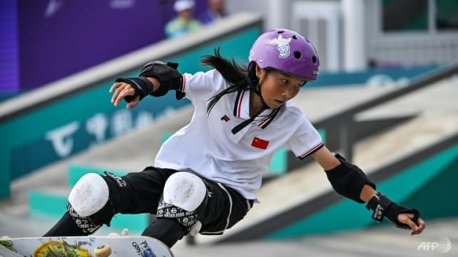 Sweet 13! China's Cui queen of the skateboard teens at Asian Games