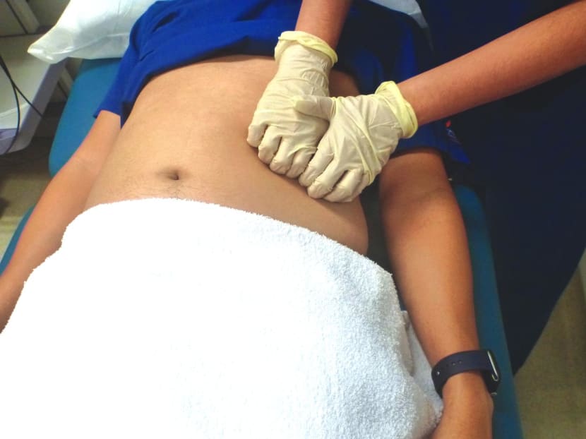 A “Hook Manoeuvre” test being done on a patient to assess if he has slipping rib syndrome, a form of chest-wall disease. It is the only test that can provide an accurate diagnosis of the condition.


