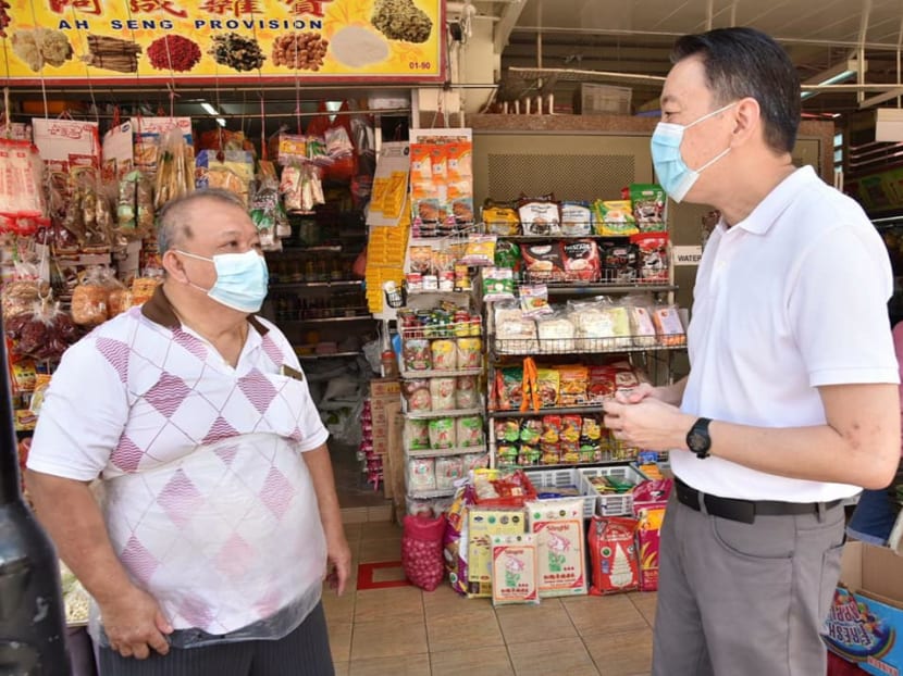 Mr Melvin Yong (right), Member of Parliament for Radin Mas, with a shopkeeper at Redhill Market and Food Centre. Mr Melvin Yong (right), Member of Parliament for Radin Mas, with a shopkeeper at Redhill Market and Food Centre.