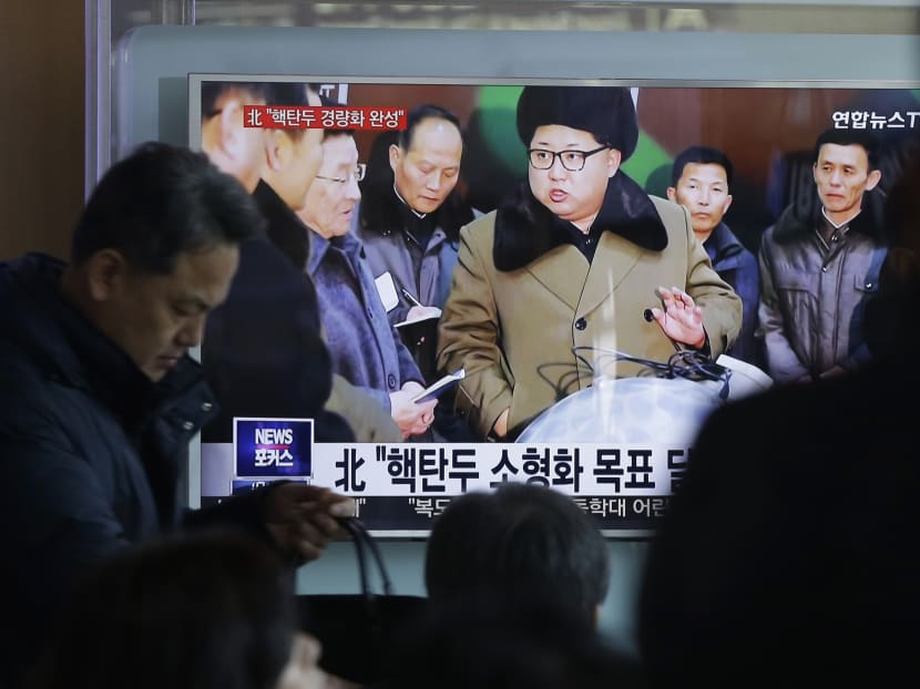 People watch a TV news program showing North Korean leader Kim Jong Un, at Seoul Railway Station in Seoul, South Korea, Wednesday, March 9, 2016. Photo: AP