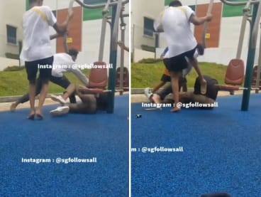A screenshot from a video showing a group of teenagers beating up a youth at a fitness corner in Serangoon. 