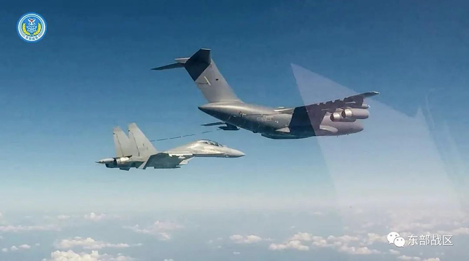 Handout image taken on Aug 9, 2022 and released by the Eastern Theater Command of the Chinese People's Liberation Army (PLA) on August 10 shows an air-to-air refuelling of a PLA fighter jet during a military drill in an undisclosed location.