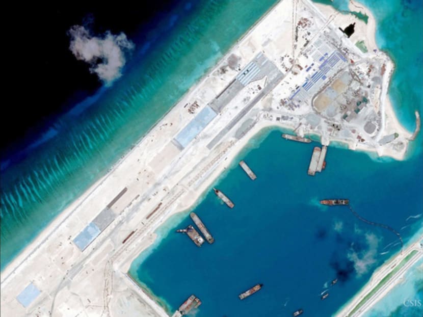 Airstrip construction on the Fiery Cross Reef in the South China Sea in a satellite image on April 2. Photo: Reuters