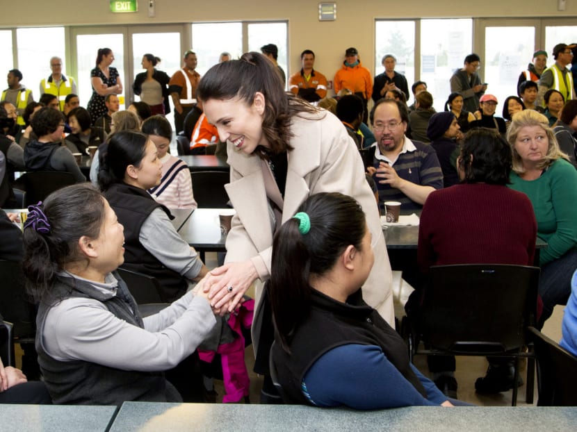 New Zealand’s opposition Labour Party leader Jacinda Ardern greeting staff at a factory while campaigning in Christchurch, New Zealand, yesterday. She has said that a government led by her party would still want to be part of the TPP, but stressed that its ‘housing bottom line’ is firm. Photo: AP