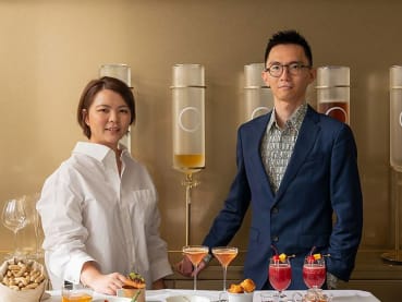 The couple serving chwee kueh, laksa and teh tarik in their Taipei cafe