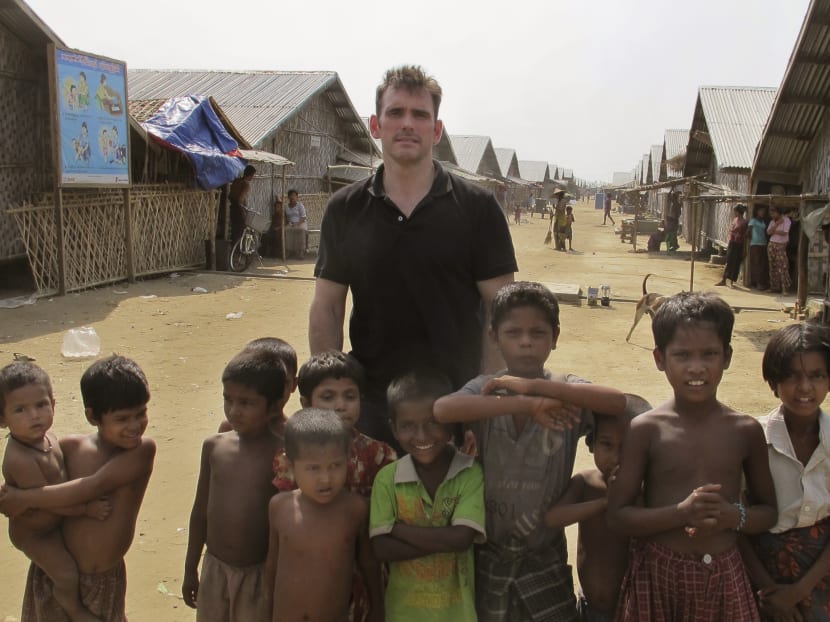 In this Friday May 29, 2015 photo American actor Matt Dillon with Rohingiya children at a camp for refugees in north of Sittwe, western Rakhine state, Myanmar. Photo: AP