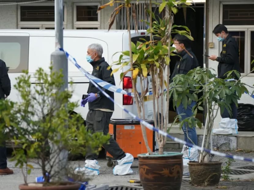 Police officers at the crime scene in Lung Mei Tsuen. Police officers at the crime scene in Lung Mei Tsuen.