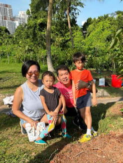 The author, Raymond Lim (second from right), and his family pictured in June 2023, during a tree planting exercise they participated in. He and his wife, Diane, are currently homeschooling both their children.