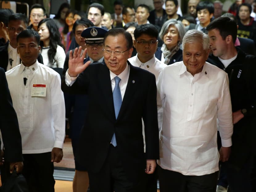 United Nations Secretary General Ban Ki Moon waves to the media after arriving in Manila. Photo: AP